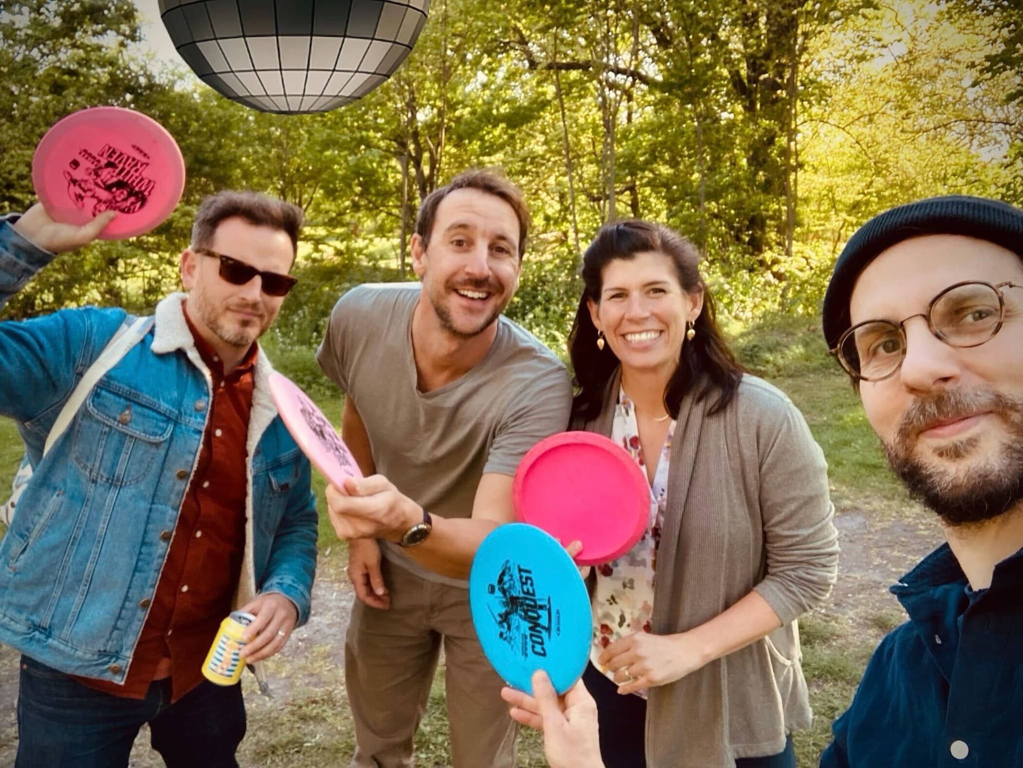 Team playing frisbee outdoors